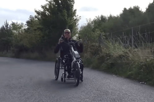 Tiga avec handbike Quickie Attitude hybride